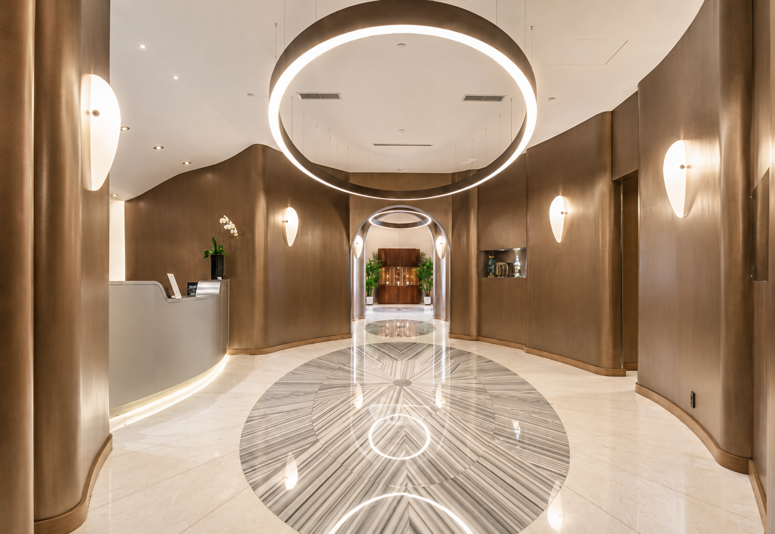 4000 Ponce lobby corridor with ring lighting and Venetian stucco walls